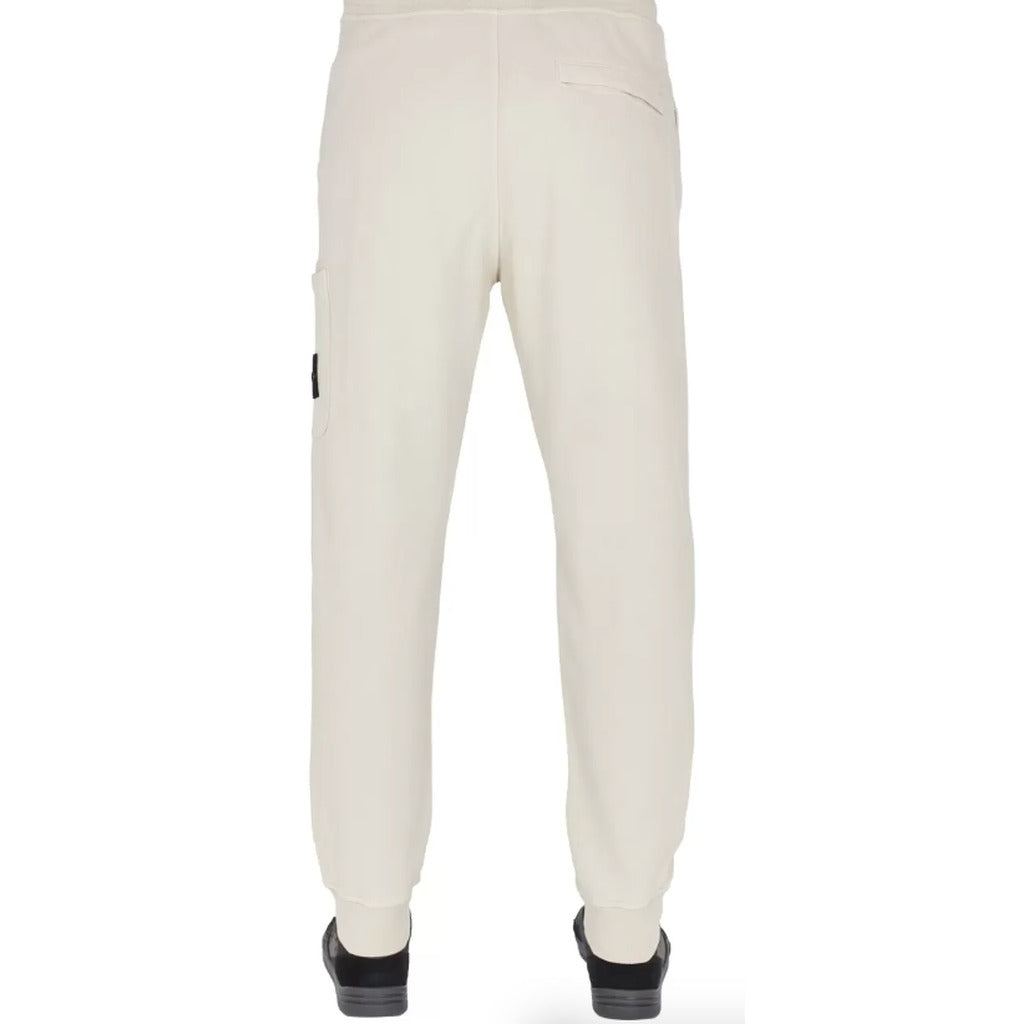 Detail of the elasticated drawstring waistband on the Stone Island white cotton tracksuit trousers.