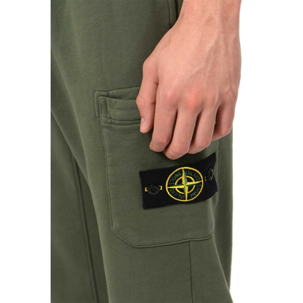 Side view of the Stone Island garment dyed green joggers.
