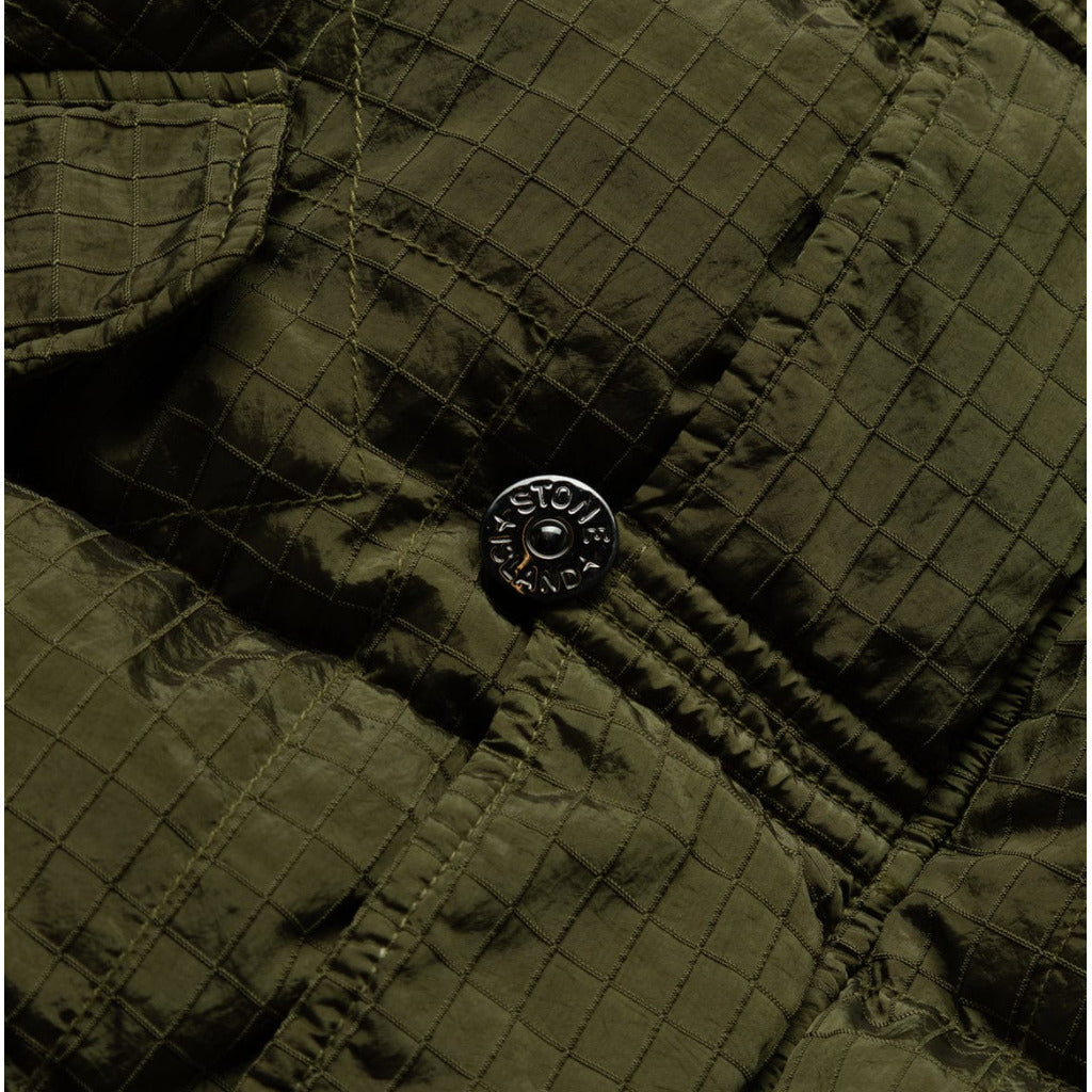 Detail of the chest pocket on the Stone Island green Nylon Metal parka