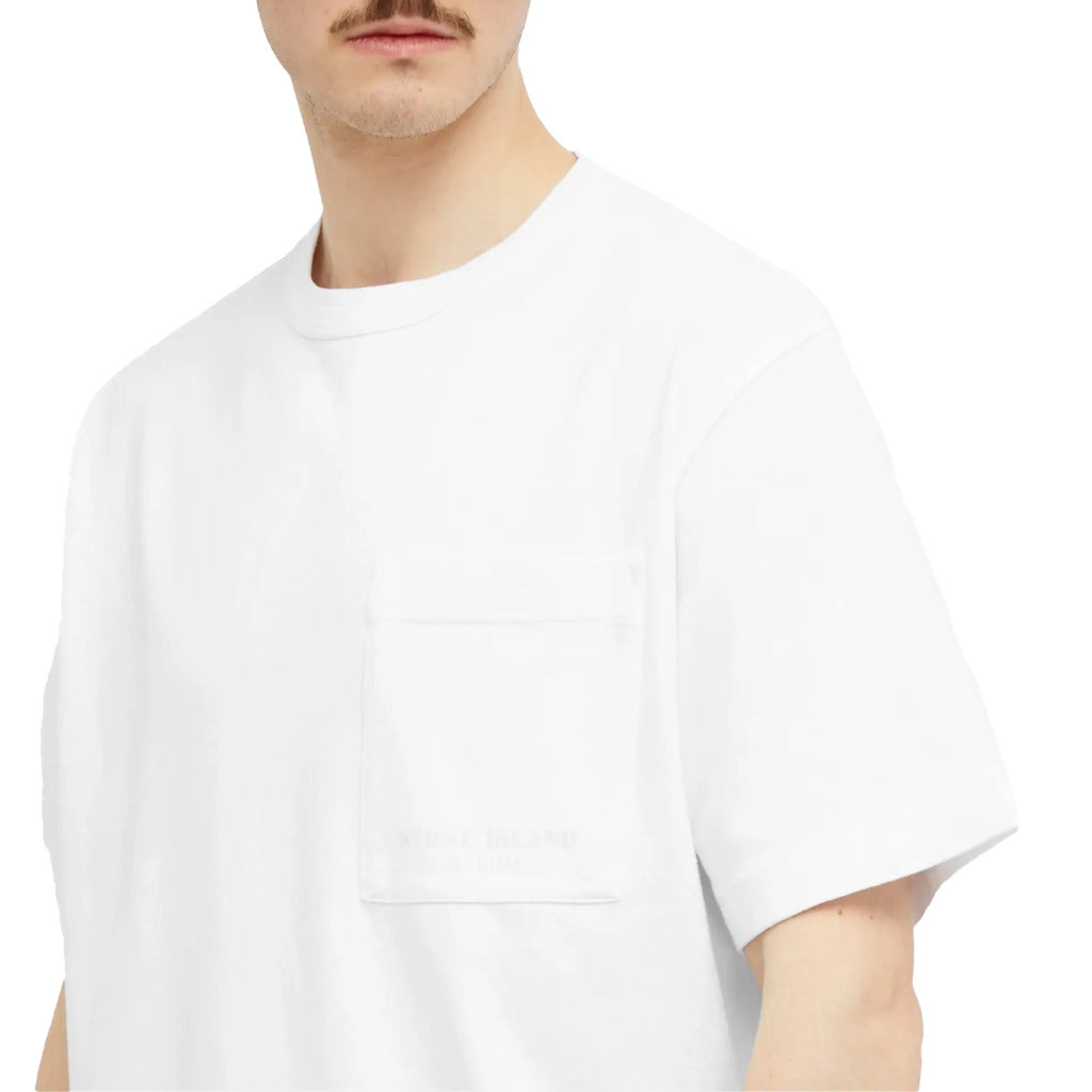 Close-up of the chest pocket with printed Stone Island logo on the white Marina t-shirt.
