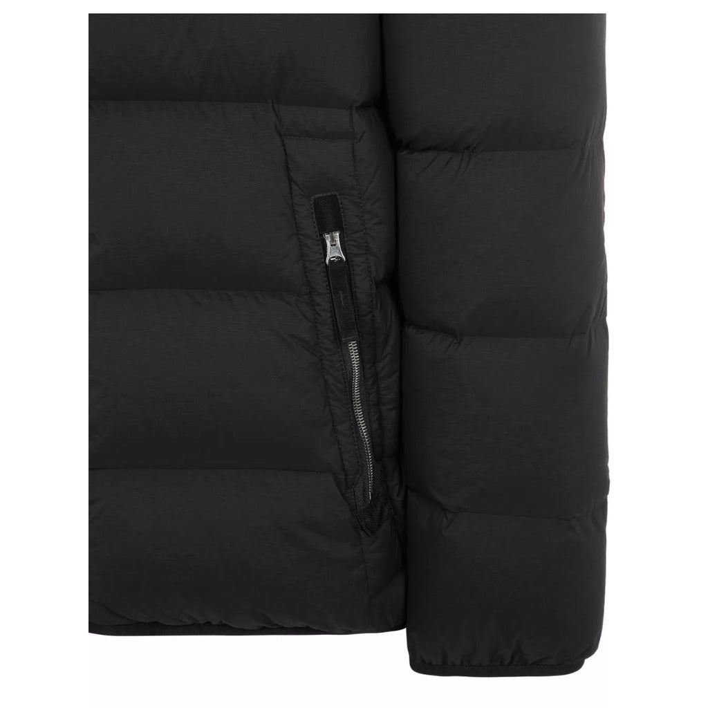 Detail showing the nylon webbing edging on the shoulder/side seam of the Stone Island jacket.

