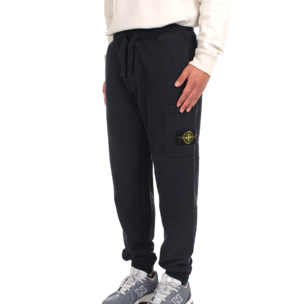 Stone Island dark blue organic cotton fleece joggers, front view.
