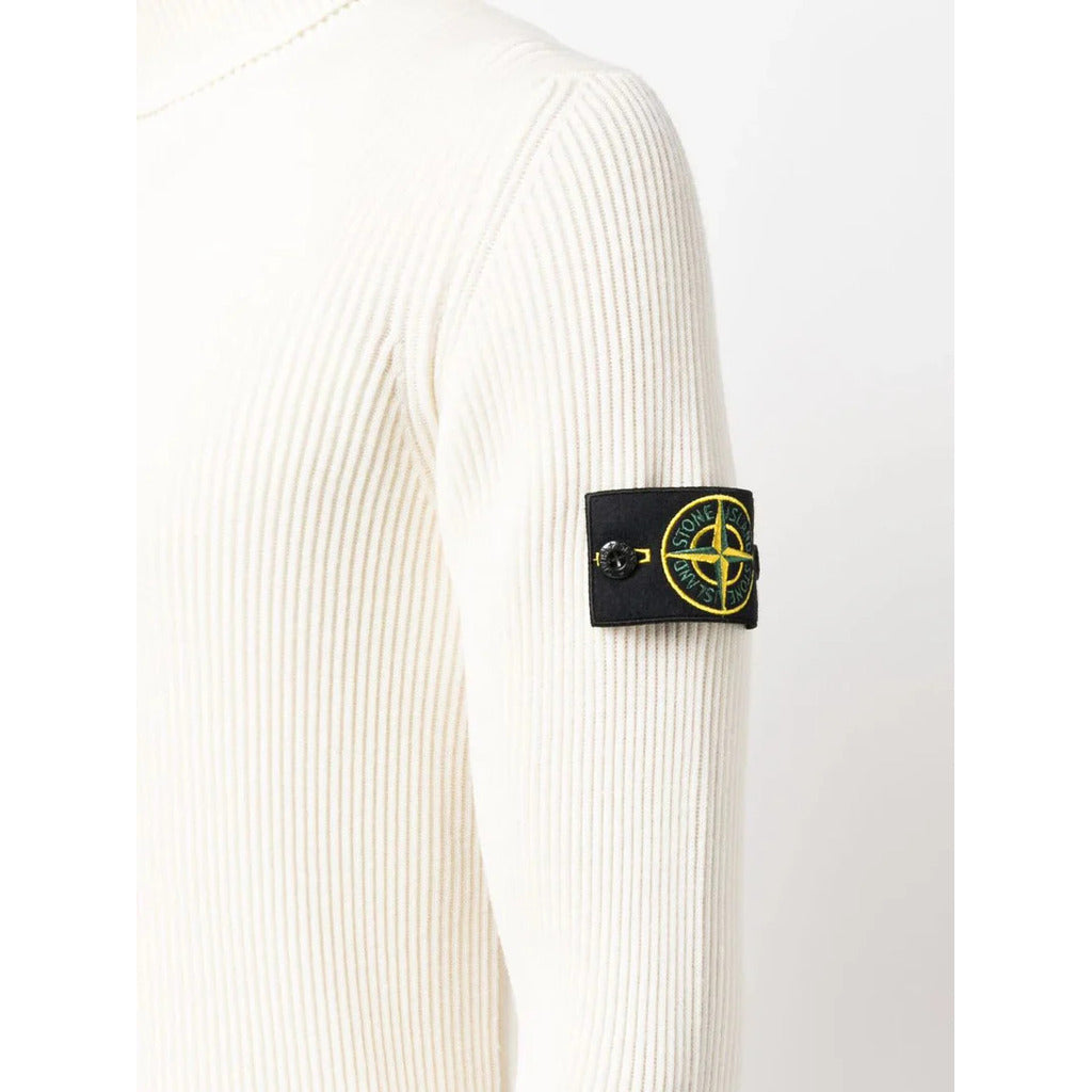  Detail showing the ribbed knit texture of the Stone Island ivory virgin wool sweater