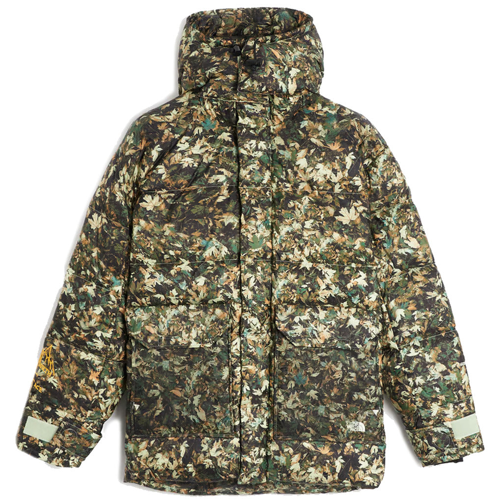 The North Face green camouflage padded parka jacket, front view with hood attached.
