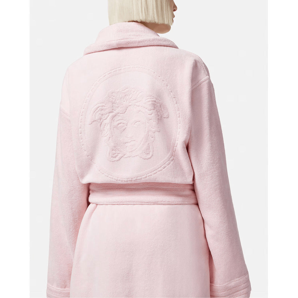 Versace pink cotton bathrobe with Medusa detail, back view, belted.
